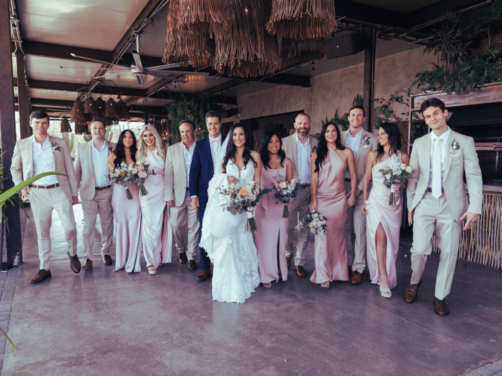 A group of people standing in front of each other at Valle de Guadalupe