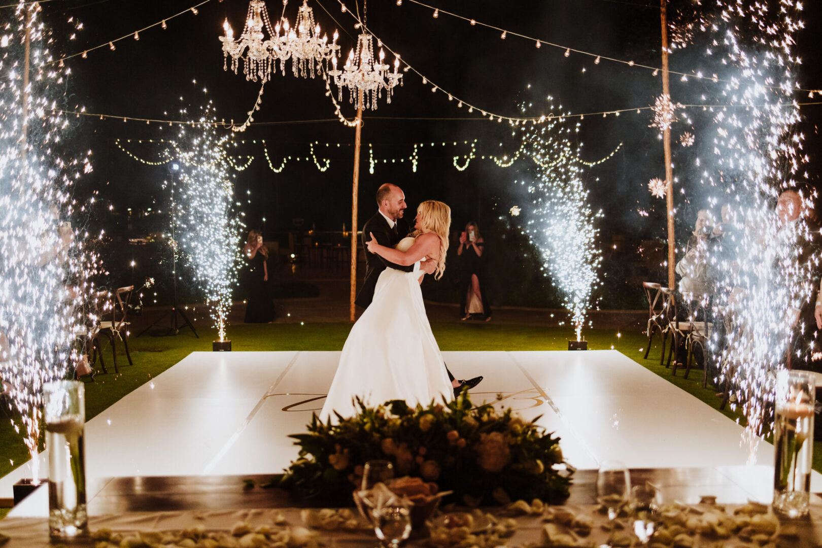 A couple is dancing on the dance floor