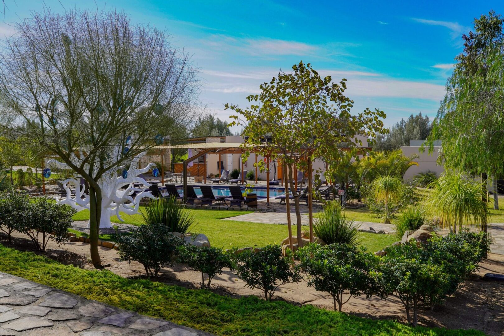 A view of a house and some trees.