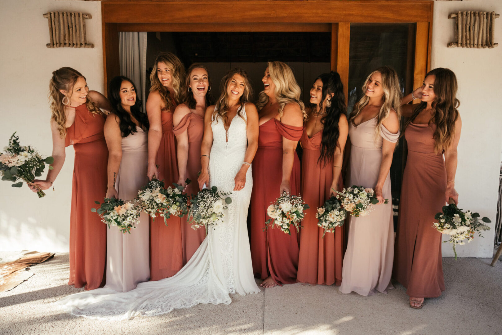 A group of women standing next to each other.